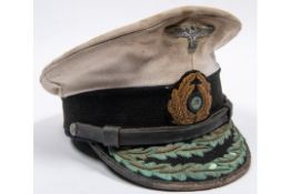 A well made copy of a Third Reich Naval officer's peaked cap, white top, gilt bullion embroidered
