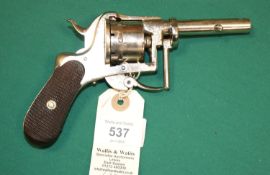 An unusual 6 shot 7mm pin fire closed frame double action revolver, 6¾" overall, round barrel 3¼",