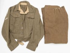 A New Zealand Tank Corp khaki BD blouse, with unit flashes, epaulette slip ons and Tank arm badge,