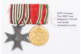 WWI medal pair: Prussian Kriegshilfe cross, and Bulgarian 1914-18 gilt war medal, mounted on bar