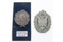 A Third Reich Army marksman's lanyard badge, of grey metal with four bend over wires; and a Driver's