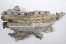 A WWII Fragment of aluminium, 18" x 9" marked "Part of a JU87 Stuka recovered from Finland,