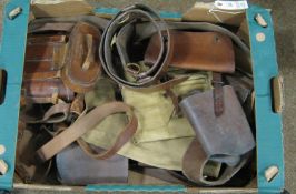 A quantity of WWI leather equipment, comprising: officer's haversack, map case, binoculars in 1915