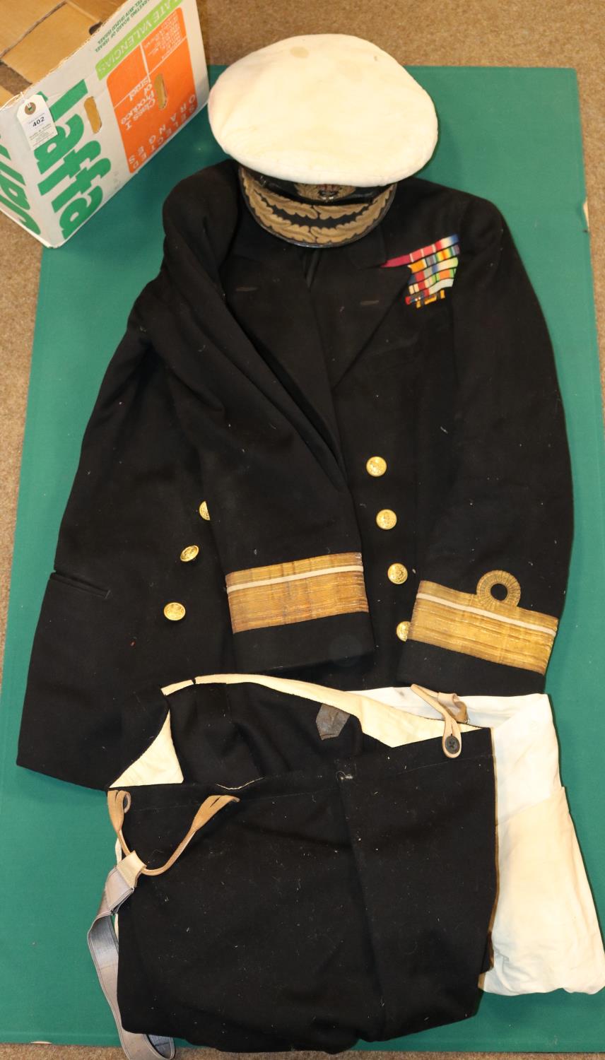 A WWII Royal Navy Flag Officers cap, bullion embroidered peak, together with jacket, trousers and