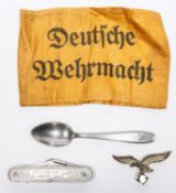 A Third Reich penknife, one side has winged figure and swastika, the other "Bussing-Nag Leipzig