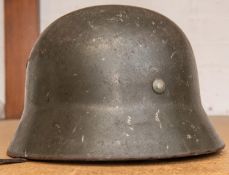 A good Third Reich M1935 Army helmet, retaining most of original finish and decals, leather lining