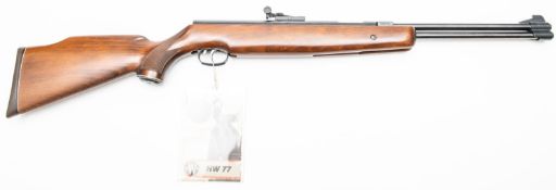 A good .22" Weihrauch HW 77k under lever air rifle, number 1013424, the stained beech stock having