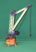 Bing GBN round wall base crane, with wooden turn handle, crane is purple and off white, with a litho