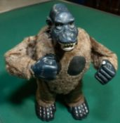Vintage King Kong wind up toy By Louis Marx, Has a wind up mechanism that makes him walk, beat his