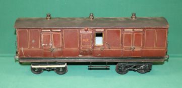 A rare Bing Gauge 3 MR bogie Guards Van. 43cm, buffer to buffer, in lined maroon livery, with dark