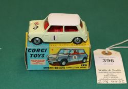 Corgi Toys Morris Mini Cooper Competition Model (227). In yellow with white roof, crossed flags to
