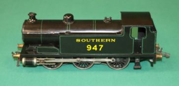 A Bassett-Lowke 12V 0-6-0 tank locomotive. A 3-rail electric example finished in Southern Railway