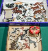 A quantity of lead farm animals and dogs and other items. Includes, cows in various poses and