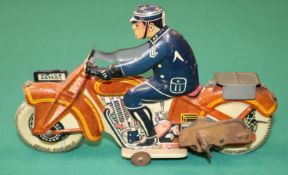 Mettoy tinplate litho Police Patrol clockwork motorcycle dating from the 1950s. Litho is in very