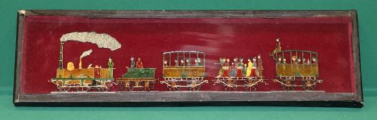 A rare mid 1800's German style "flat" tender locomotive and coach set. A 2-2-2 locomotive with a 4