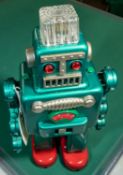 Vintage tinplate "Smoking Robot " by Yonezawa , Made in Japan, possibly from the 1950s or 1960s.