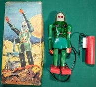 Dux Astroman Electric Robot toy. Comes with remote control. Robot has a clear green plastic body
