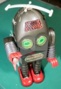 A tinplate and plastic "Thunder Robot " in the style produced by Asakusa (no Trade Mark to the