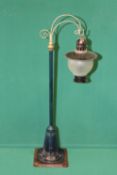 Bing Matching pair of tinplate and metal street lamps, Both finished in dark blue with brown