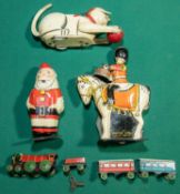 4 vintage Clockwork tinplate toys. Wells Brimtoy Santa Clause with walking action, Drummer on