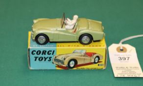 Corgi Toys Triumph TR3 (305). In metallic green with red seats, with screen and racing driver