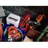 A pair of car ramps, a garden vac blower, various plastic baskets, burning torch, decorative