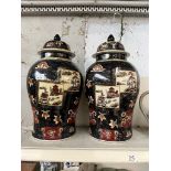 A pair of early 20th century Chinese famille noire lidded vases, height 50cm.