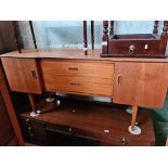 A mid 20th century teak sideboard, width 142cm.