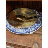 A blue and white Minton charger and an oil painting on plate.