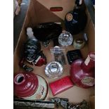 A box of collectables to include cast metal money box, table cigarette lighters, toast rack, 3 empty