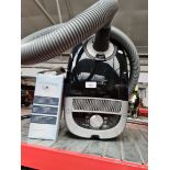 A Miele S5210 cylinder vacuum cleaner.