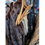 3 fur coats, stoles and a beaded wrap.