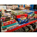A collection of vintage jigsaws and games.