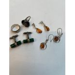 Silver rings, two pairs of silver and amber earrings and a pair of silver cuff-links.