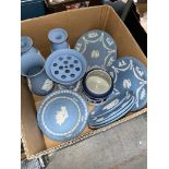 A box of Wedgwood Jasper ware comprising mainly plates and vases.