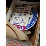 A box of assorted items including books, prints, a pair of Wedgwood plates, 1964 FA Cup Final