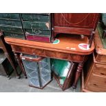 A Victorian fold top mahogany tea table.