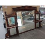 An Edwardian inlaid rosewood over mantel mirror.