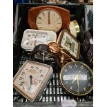 A box of assorted clocks.