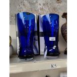A pair of boxed blue Dartington Crystal vases.