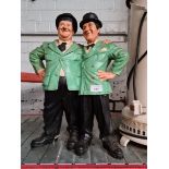 Laurel & Hardy composite figure.