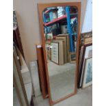 A mid 20th century teak framed mirror, a copper horse picture and another mirror.