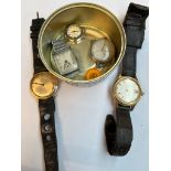 A small tin containing 5 wristwatches