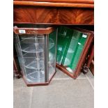 A Stratton of London revolving display cabinet together with a glazed table top display cabinet.