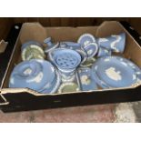 A box of Wedgwood Jasper ware including plates and vases.