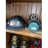 A military helmet and a gas mask.