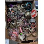 A box of costume jewellery mainly bangles