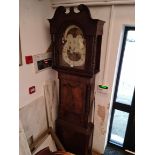 A Georgian mahogany eight day longcase clock with moon dial, weights and pendulum.