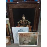 A large Eastern / Oriental framed wall plaque depicting an Asian emperor, in relief together with