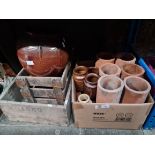 A quantity of earthenware pots and ink bottles, terracotta drain pipes, a large salt glazed pot
